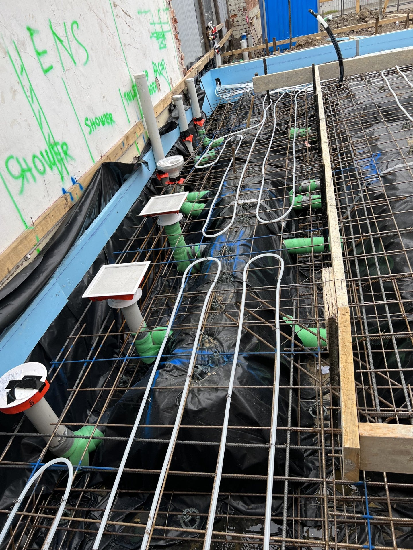 Uponor pipes tied to reo bars in slab